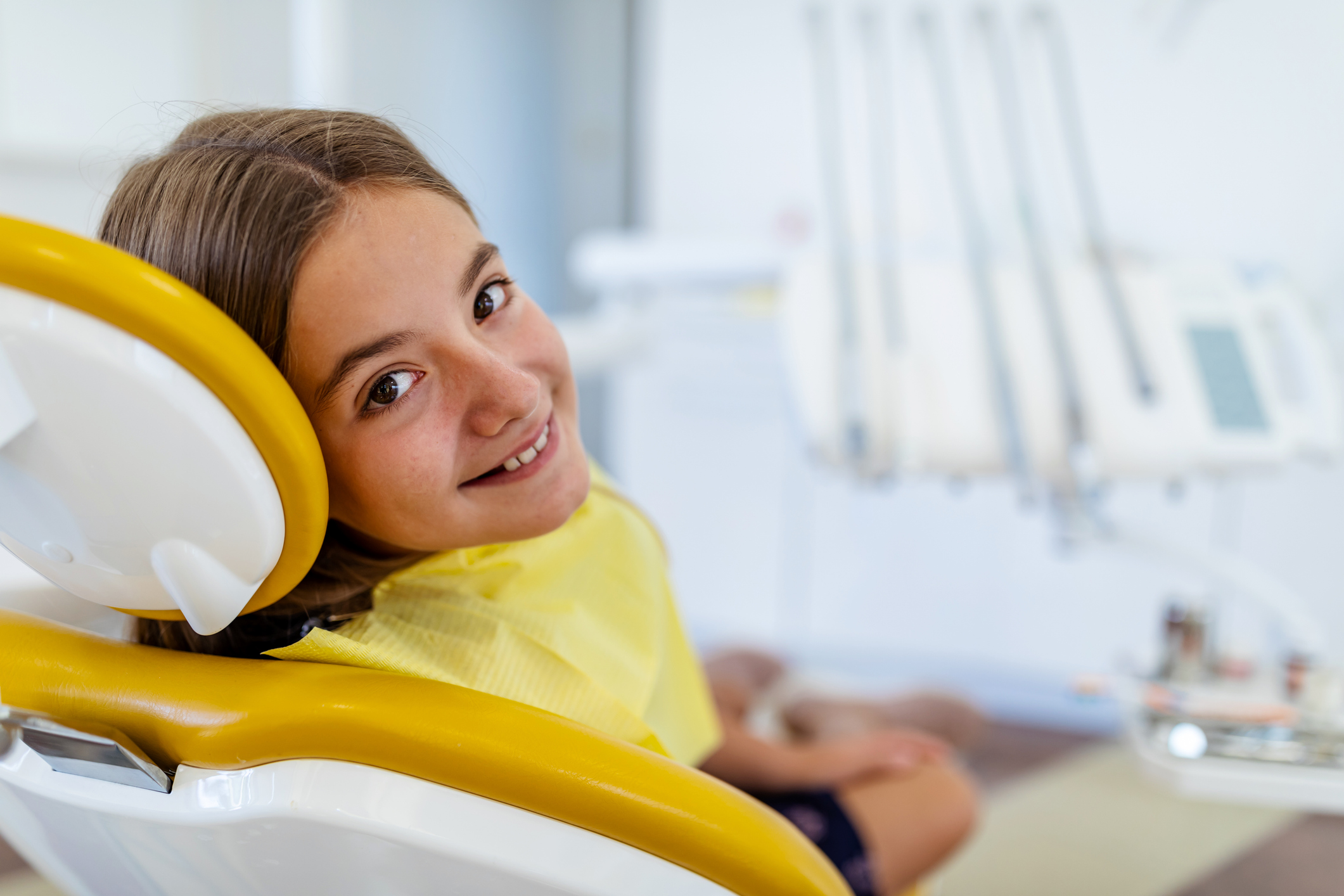 Happy young teen at dentist